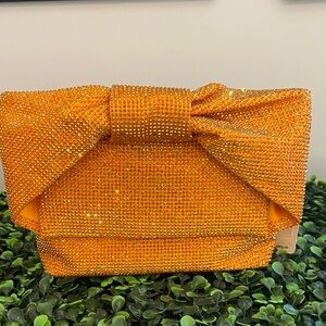 Olga Berg Orange Crystal Bow Clutch